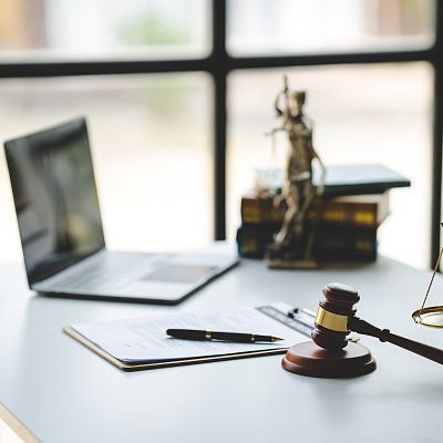 law-firm-courtroom-law-books-computer-and-scales-2025-03-07-20-41-25-utc