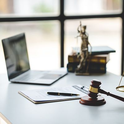 law-firm-courtroom-law-books-computer-and-scales-2025-03-07-20-41-25-utc